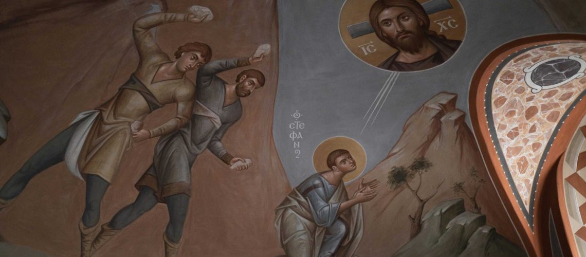 Intricate fresco in a church showcasing a biblical scene with vibrant religious art.